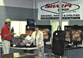 Sharpe Bros. employees enjoy a buffet meal and prizes to celebrate the two-year mark.