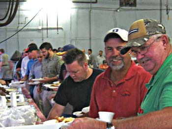 Sharpe Bros. employees enjoy a buffet meal and prizes to celebrate the two-year mark.