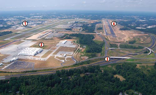 To accommodate expansions at Piedmont Triad International Airport in Greensboro, NC, Vecellio & Grogan performed site work, road building and bridge construction, with Sharpe Bros. adding fine grading, utilities and asphalt paving, for: (1) a new Honda jet manufacturing facility; (2) a new FedEx regional cargo hub; (3) the realignment of Bryan Blvd.; and (4) a new 9,000-ft. runway, with taxiways. 