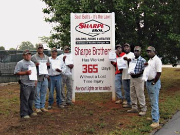 Sharpe Bros. recently celebrated a full year with no lost time accidents. Pictured here are just a few of the divisions 90 employees. From the left are Yoniver Sanchez, Gabino Banda, Antonio Pablo Cruz, William Daniels, Albert Avent, Stefan Parker, Donnie Page and Albert Lee.