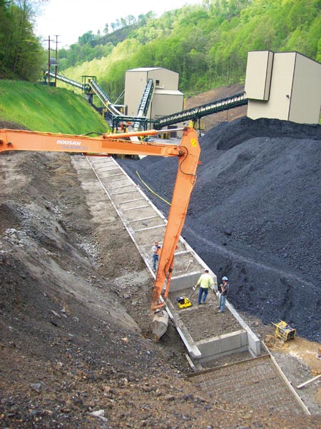 Vecellio & Grogan is building a retaining wall for Central Appalachian Mine under a design-build contract. (Photo by Matt Farley)