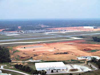 V&G is performing site work for a Honda aircraft factory at Piedmont Triad International Airport in Greensboro, NC. On the right in the background is V&Gs FedEx project. (Photo by John Riley, Jr.)