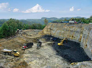 Vecellio & Grogan removed more than 50 feet of overburden and sloped back the high wall to prepare a coal mine site for Peach Tree Mining in Bolt, WV.
