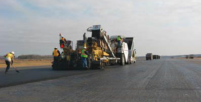 A photo of paving work by Vecellio & Grogan's Sharpe Bros division, taken by Division Safety Manager John Riley, Jr., on a new runway at Piedmont Triad International Airport in Greensboro, NC, was selected as a finalist in Engineering News-Records 2009 photo contest. (Photo by John Riley, Jr.)